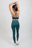 buttery soft recycled nylon teal longline sports bra and high waist yoga leggings with pocket