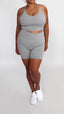 Grey sustainable yoga bra and bike shorts for women