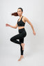 eco-friendly womens activewear performance black compression leggings and high support sports bra 