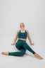 eco-friendly high-waist buttery soft teal leggings and longline bra for yoga and pilates