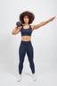 womens recycled high waisted navy workout leggings with pockets and adjustable high support sports bra