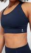 recycled fabric supportive adjustable sports bra and compression leggings in navy blue